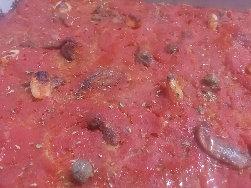 Pizza di pane nero valdostano: il riciclo serio